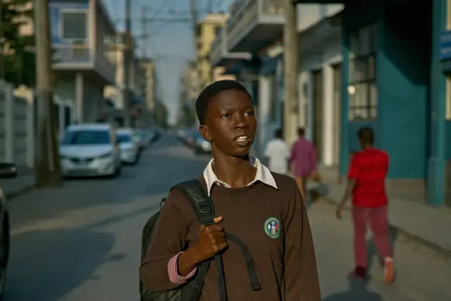 A young worker on a street in Accra